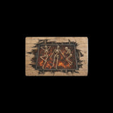 Hellfire grill beneath cracked floorboards with roasting skeletons on kitchen mats