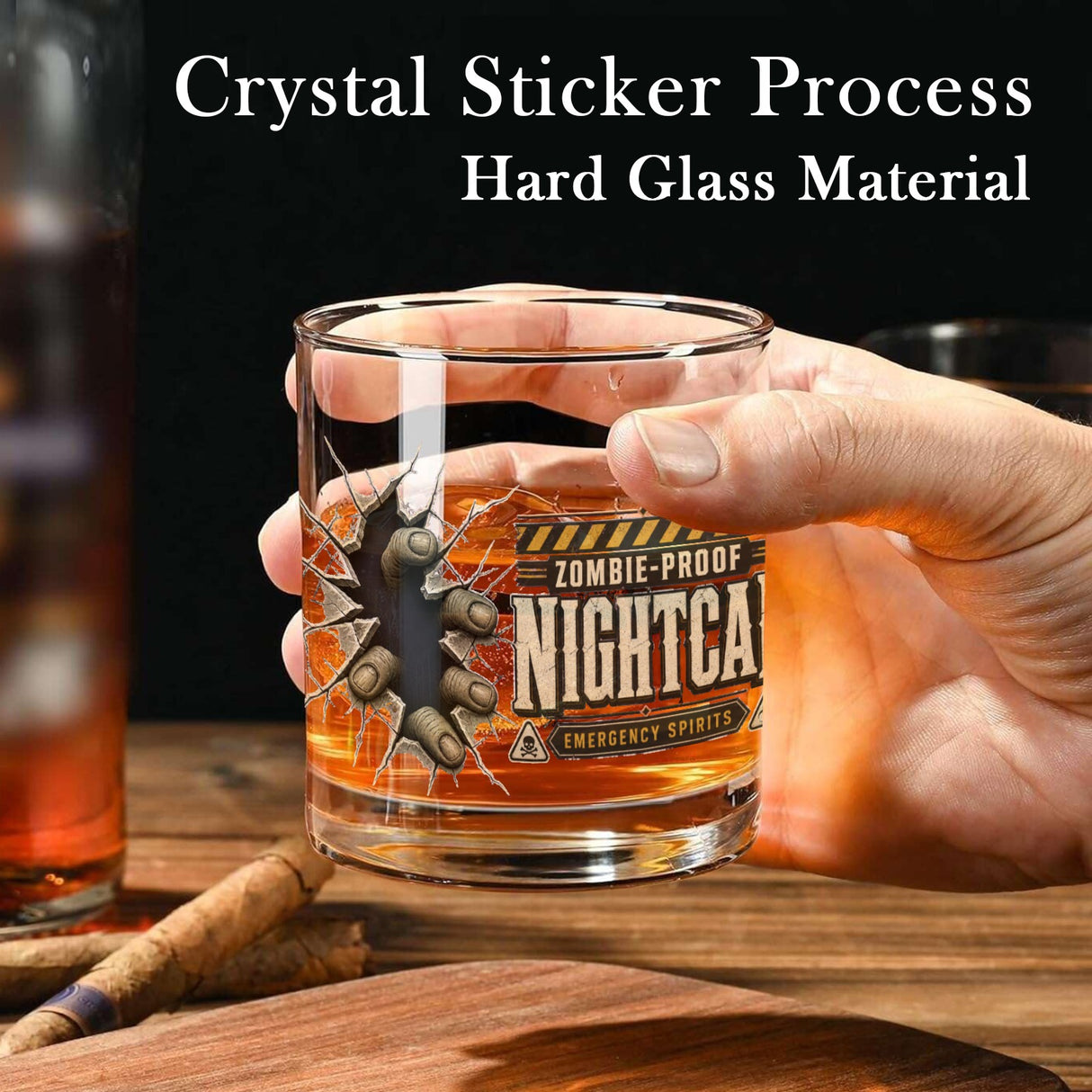 Zombie fingertips breaking through cracked glass beside a vintage nightcap label on whiskey glasses, product view 4