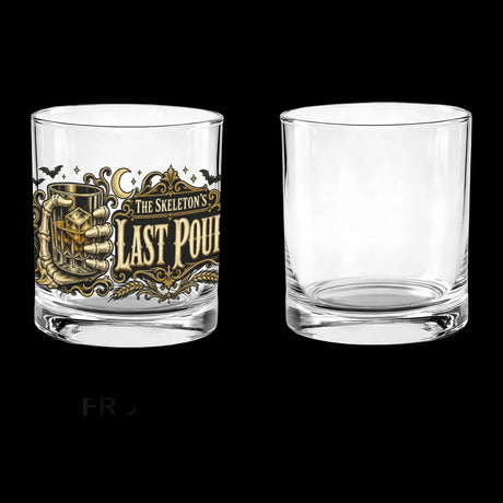 Skeleton hand gripping the glass beside an ornate Last Pour label on whiskey glasses, product view 2